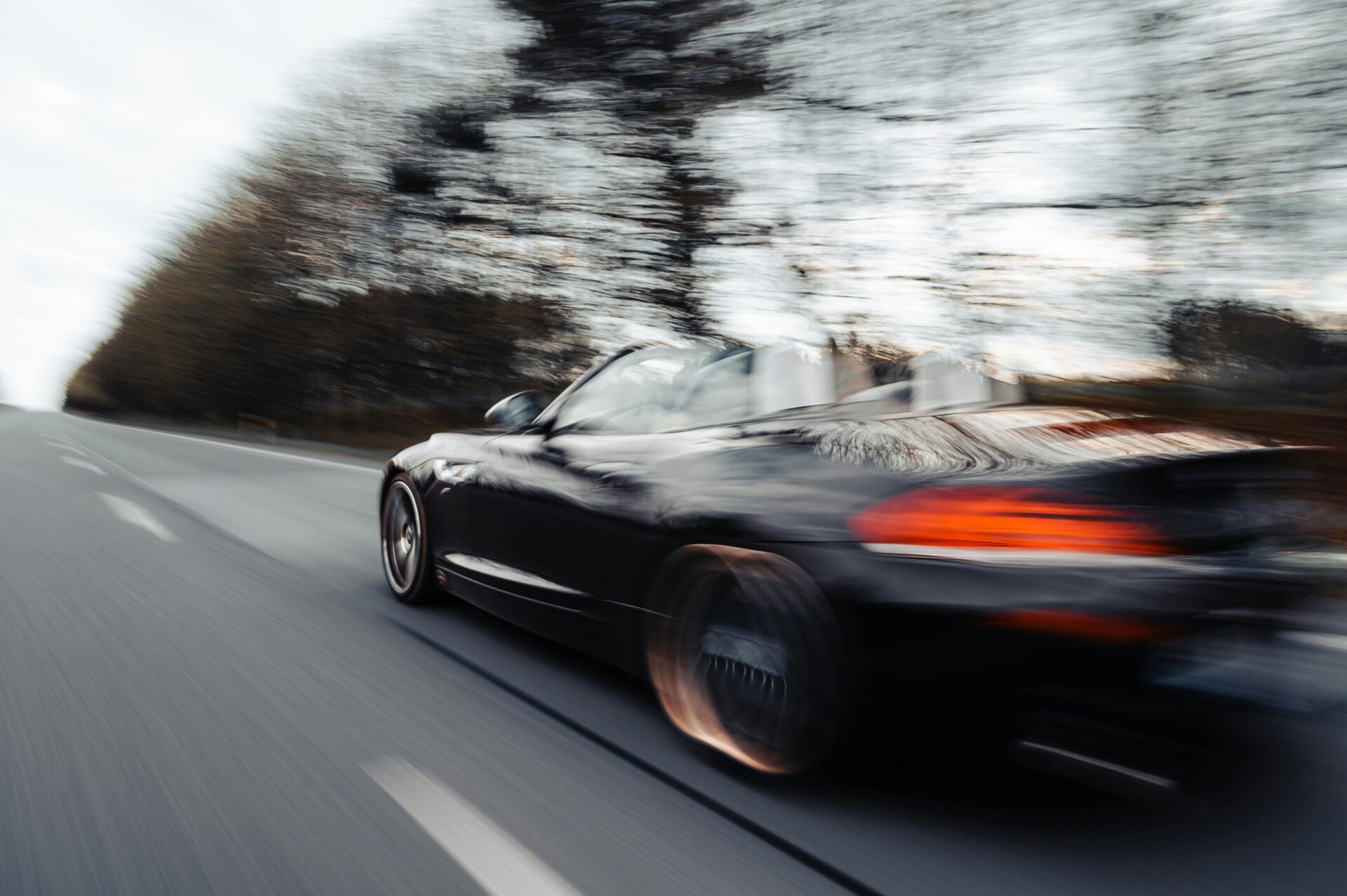 speeding car with motion blur following